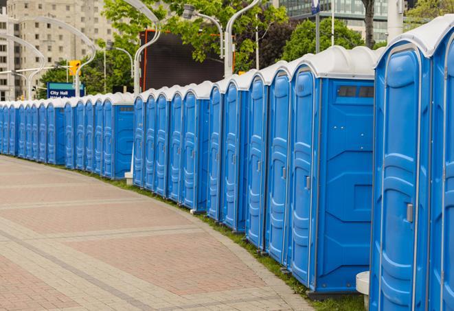 a row of portable restrooms at a trade show, catering to visitors with a professional and comfortable experience in Carson